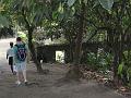 Meno and Ross at the coconut oven and slave quarters at Anse Mamin